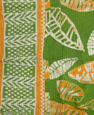 colorful kantha blanket made from upcycled vintage saris
