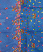 colorful kantha blanket made from upcycled vintage saris
