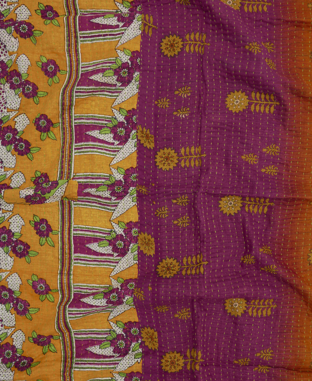colorful kantha blanket made from upcycled vintage saris