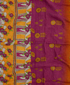 colorful kantha blanket made from upcycled vintage saris