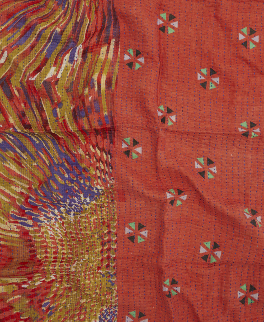 colorful kantha blanket made from upcycled vintage saris