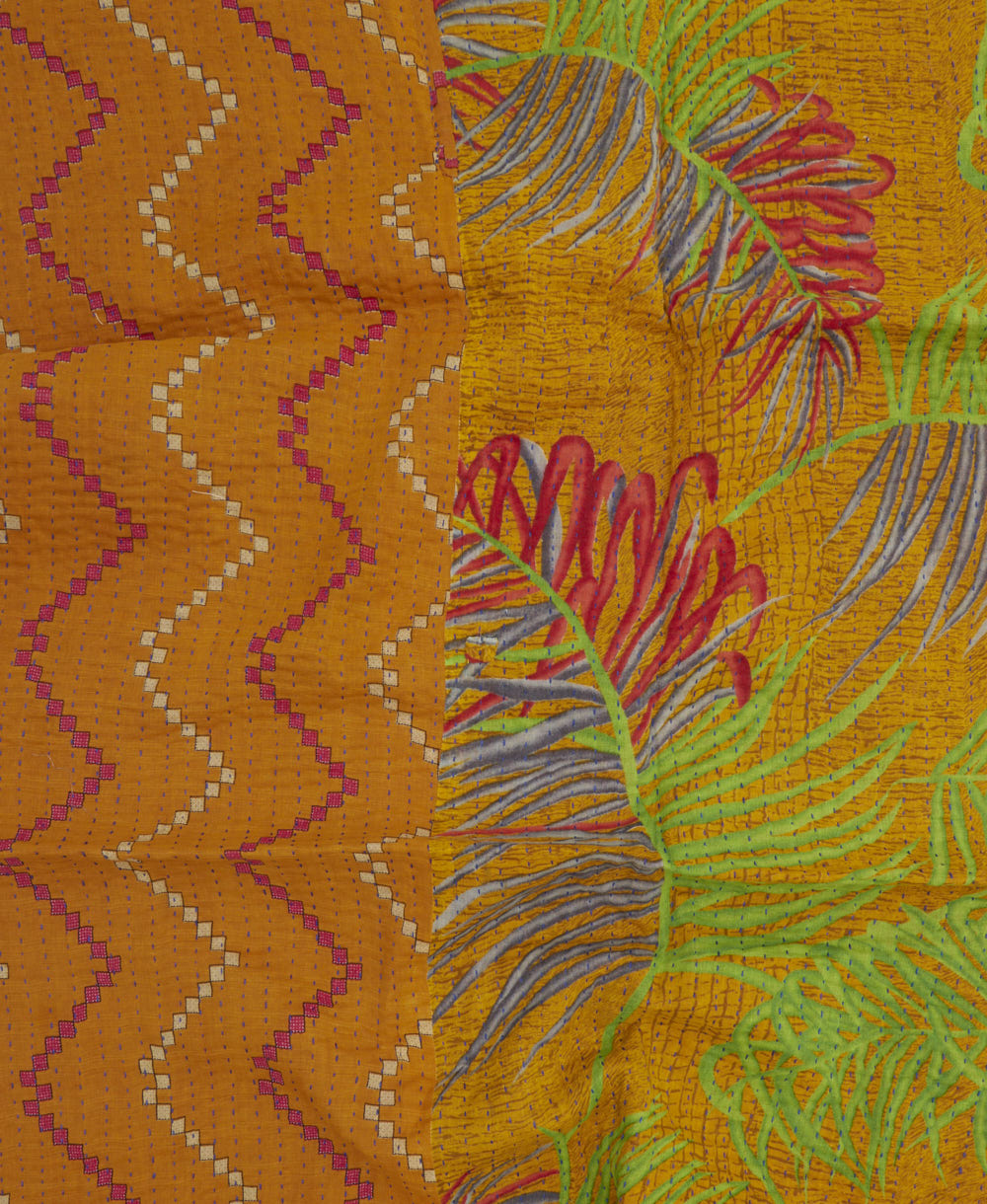 colorful kantha blanket made from upcycled vintage saris