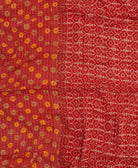colorful kantha blanket made from upcycled vintage saris