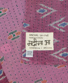 small kantha blanket with signature of the maker on the tag