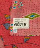 small kantha blanket with signature of the maker on the tag