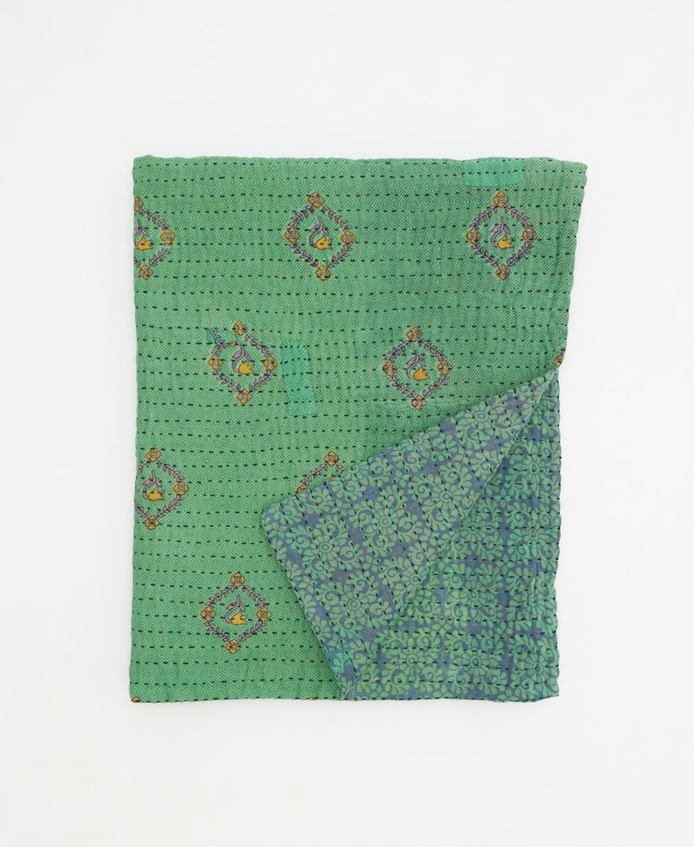 small kantha quilt handmade in India by women artisans from vintage cotton saris