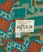 small kantha blanket with signature of the maker on the tag