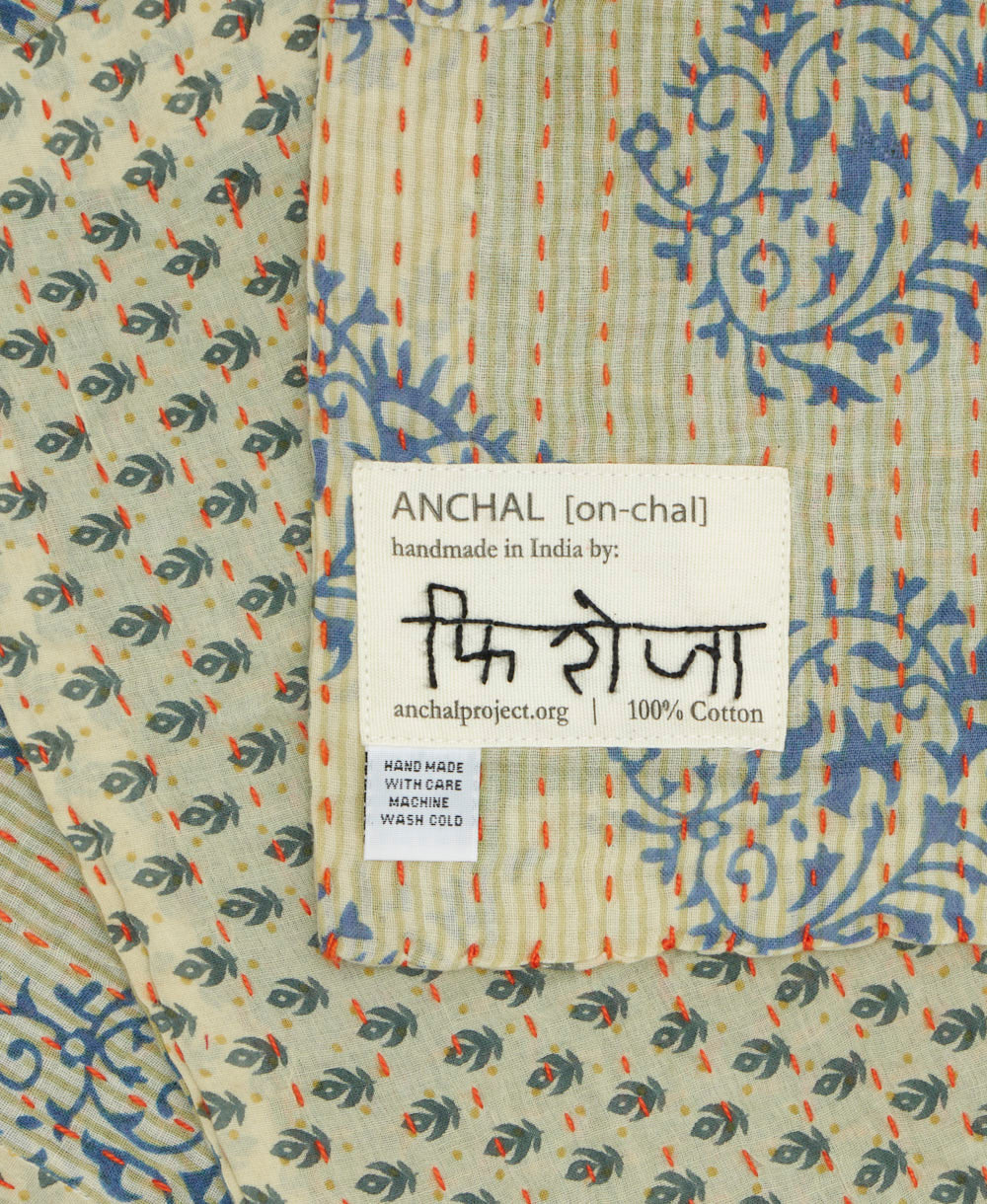 small kantha blanket with signature of the maker on the tag