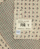 small kantha blanket with signature of the maker on the tag