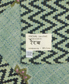 small kantha blanket with signature of the maker on the tag