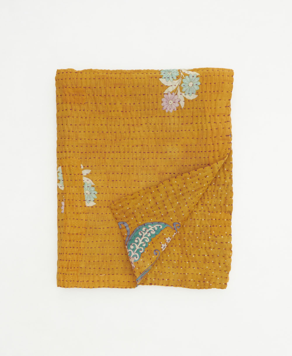 small kantha quilt handmade in India by women artisans from vintage cotton saris