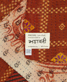 small kantha blanket with signature of the maker on the tag