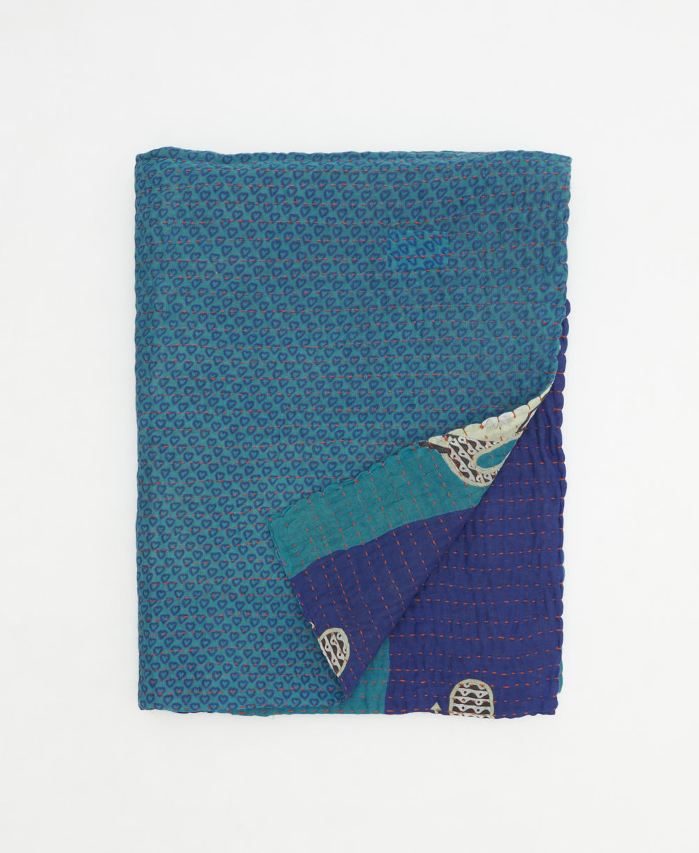 small kantha quilt handmade in India by women artisans from vintage cotton saris