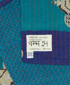 small kantha blanket with signature of the maker on the tag
