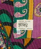 small kantha blanket with signature of the maker on the tag