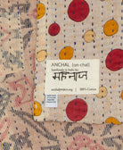 small kantha blanket with signature of the maker on the tag