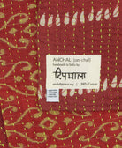 small kantha blanket with signature of the maker on the tag