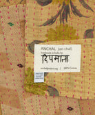 small kantha blanket with signature of the maker on the tag