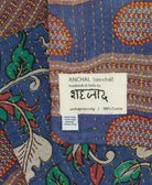 small kantha blanket with signature of the maker on the tag