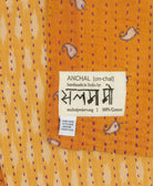 small kantha blanket with signature of the maker on the tag