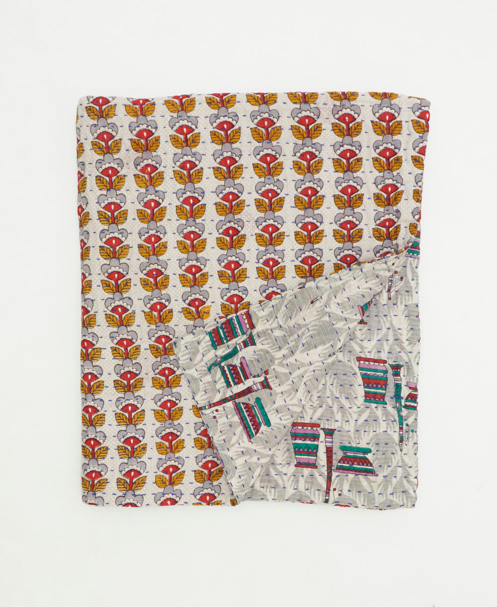 small kantha quilt handmade in India by women artisans from vintage cotton saris