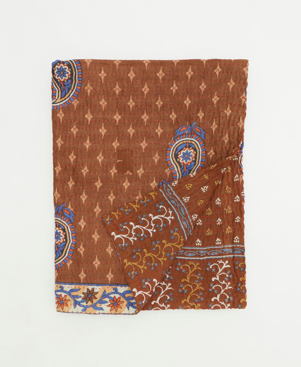 small kantha quilt handmade in India by women artisans from vintage cotton saris