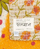 small kantha blanket with signature of the maker on the tag