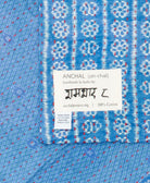 small kantha blanket with signature of the maker on the tag