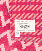 small kantha blanket with signature of the maker on the tag