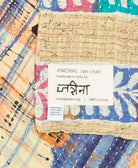 small kantha blanket with signature of the maker on the tag