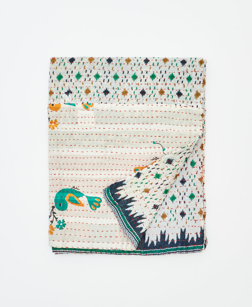 small kantha quilt handmade in India by women artisans from vintage cotton saris