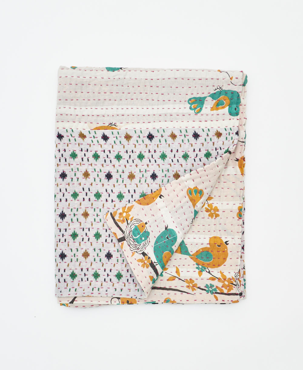 small kantha quilt handmade in India by women artisans from vintage cotton saris