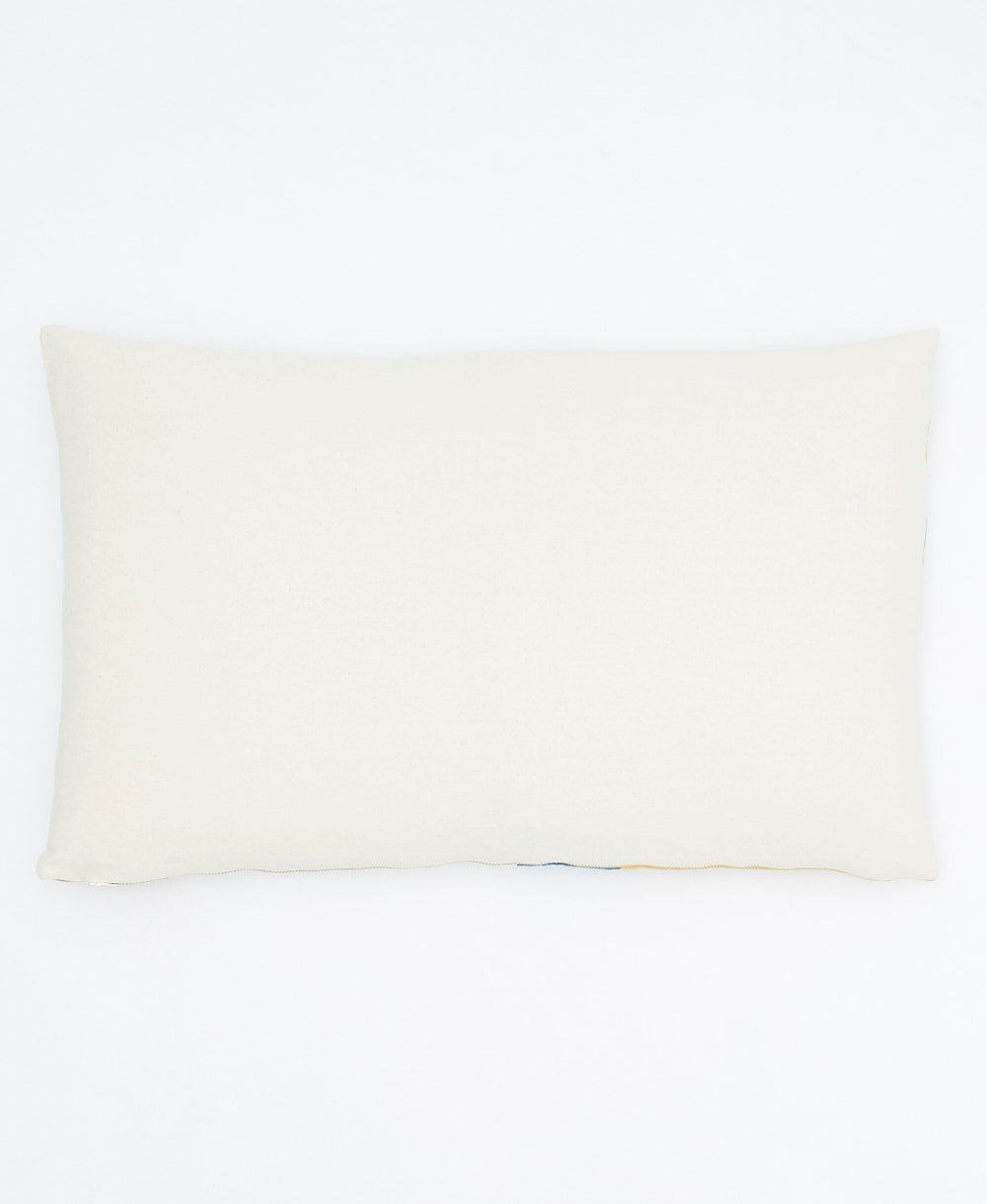 back of stamp lumbar pillow in solid natural white made from 100% organic cotton