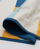 stamp patchwork quilt in white and cobalt blue