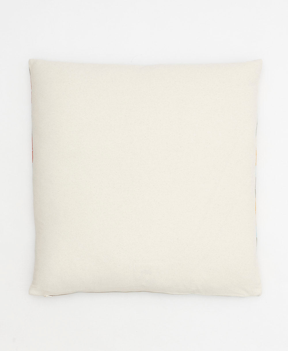 back of stamp throw pillow made from 100% organic cotton