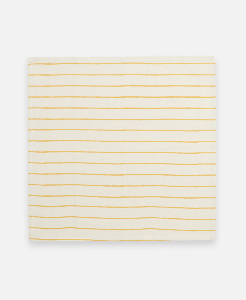 stripe block print napkin in mustard yellow handcrafted from 100% organic cotton