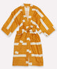 Soft cotton robe made out of organic cotton featuring a mustard and white striped pattern 