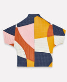 unique colorful quilted jacket in cocoon silhouette with yellow, orange, navy, pink and white panels handmade in India