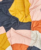 colorful embroidered patchwork quilt made from 6 layers of 100% organic cotton in India