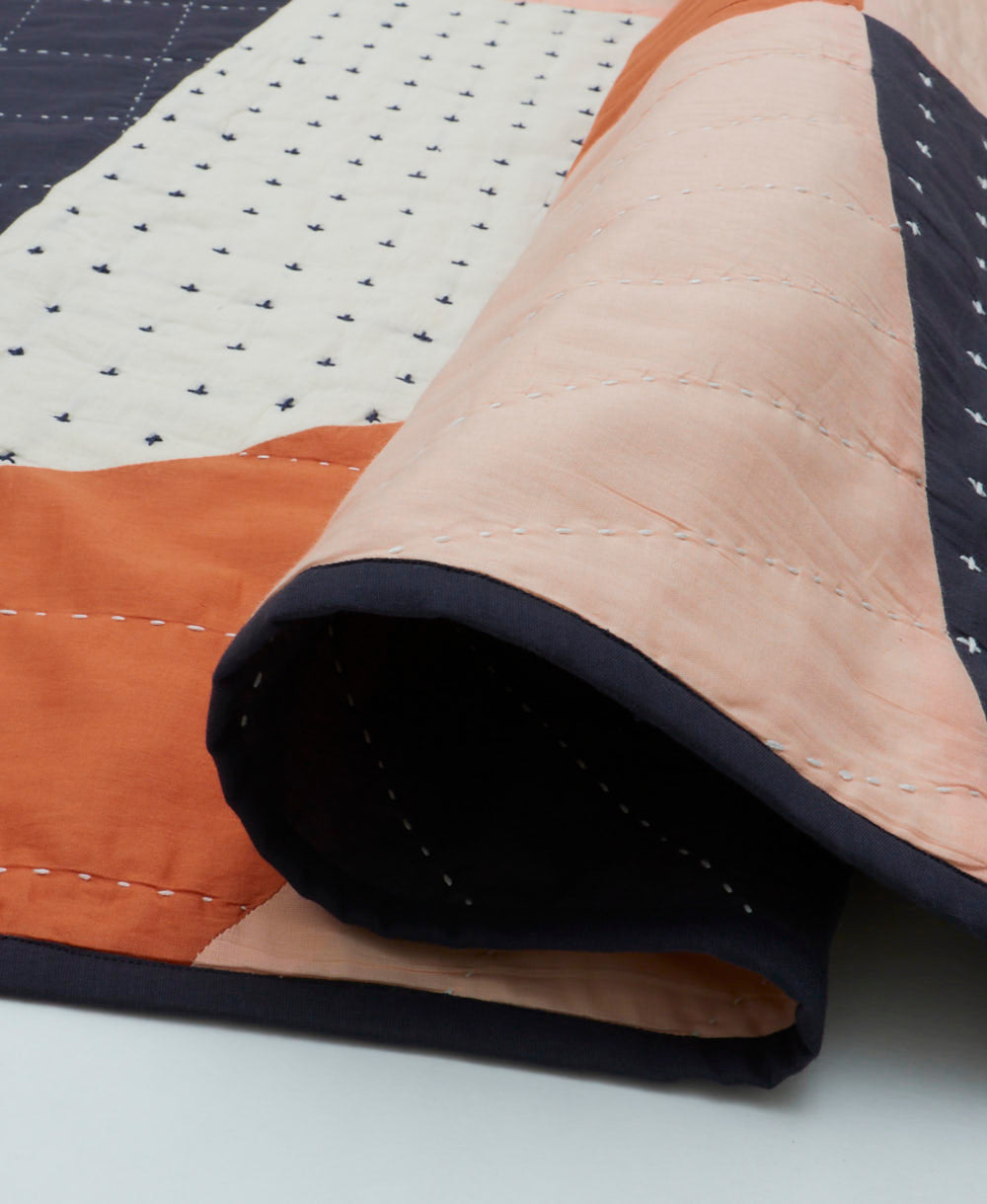 modern patchwork quilt density shot | lightweight quilt