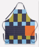 Colorful quilted apron with a patchwork pattern on a white background