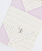 lilac purple and white cotton baby quilt with black stitch embroidery