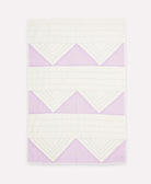 lilac and white 100% organic cotton baby quilt with triangle design