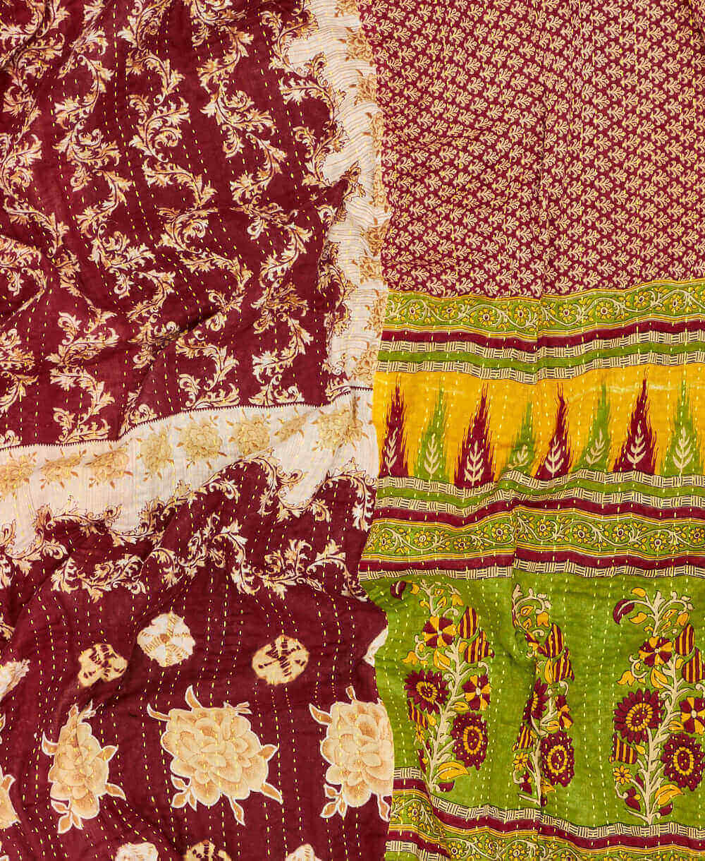 burgundy floral kantha quilt featuring traditional hand sitiching 