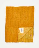 yellow paisley print quilted throw in twin size handmade in India by Anchal artisans