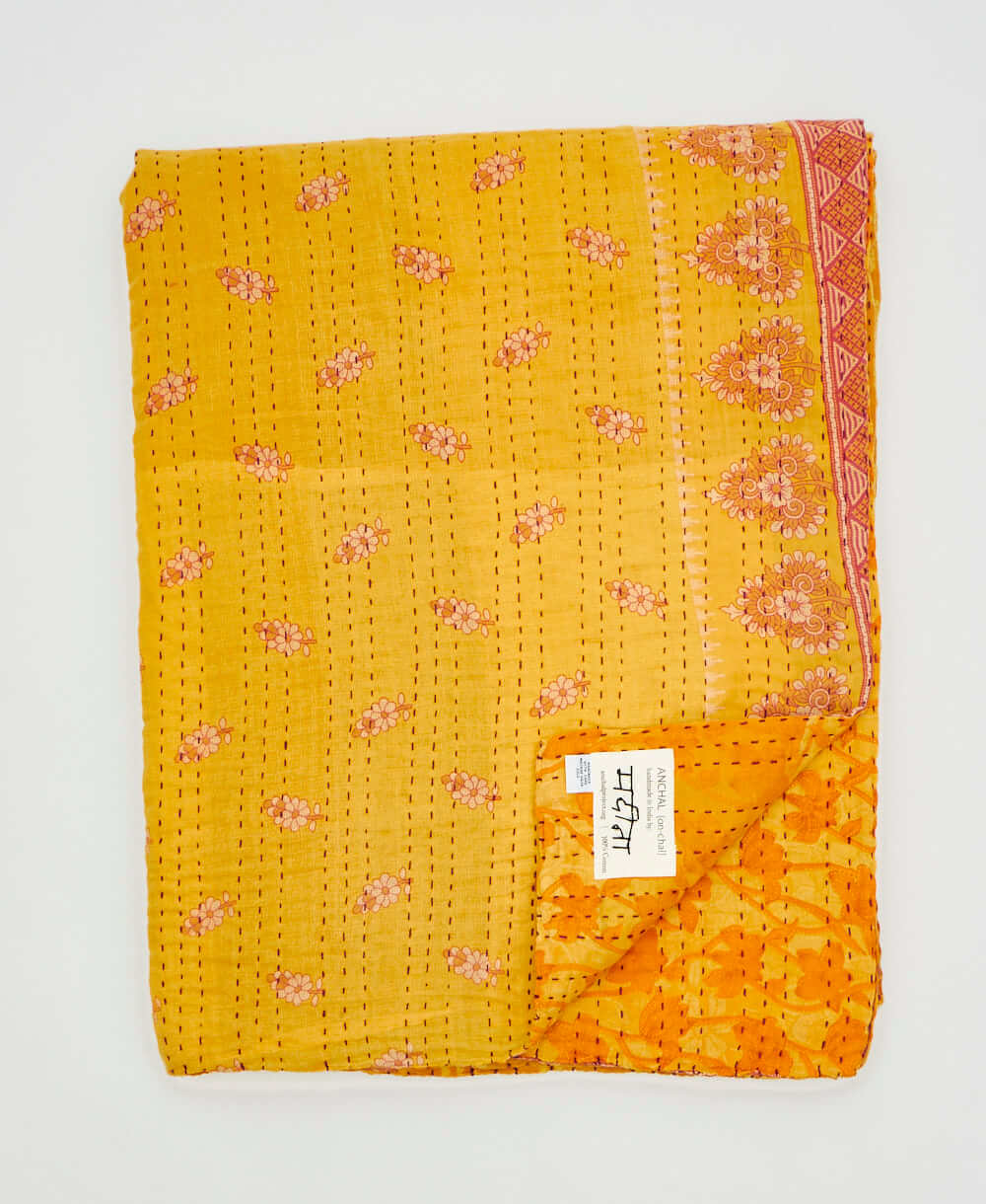 yellow floral print quilted throw in twin size handmade in India by Anchal artisans