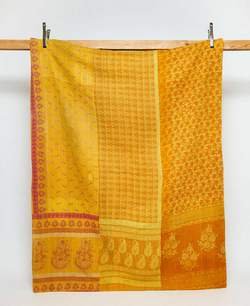 yellow twin kantha quilt in a floral  pattern handmade in India