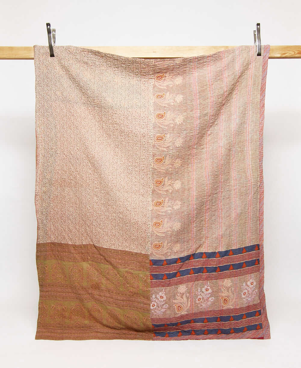 light tan and pink twin kantha quilt in subtle floral pattern handmade in India