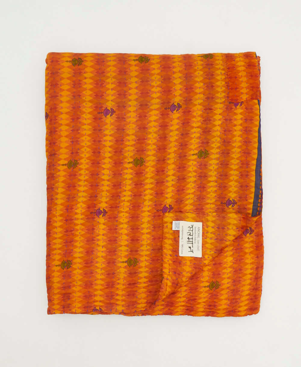 orange and red diamond quilted throw in twin size handmade in India by Anchal artisans