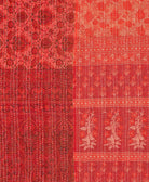 sustainable kantha quilt in twin size with a coral & red floral pattern by Anchal